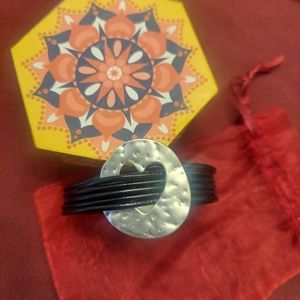 Leather (?) And metal heart bracelet